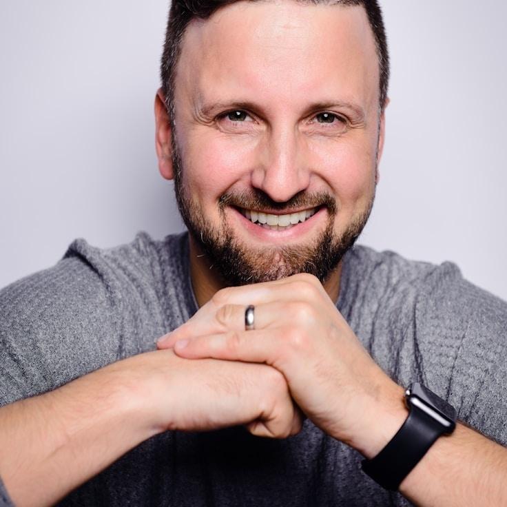 Avery Chen, Lead Design Curator at Nova Field Gallery, reviewing corporate floral arrangements